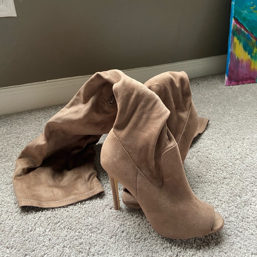 Y’all, tan thigh high boot.